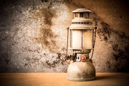 still life of old hurricane lamp