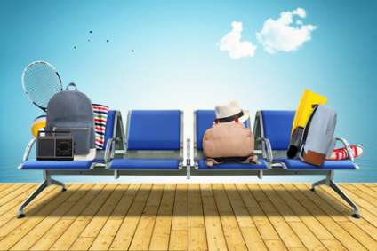 Vacation, seats at the airport with bags