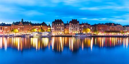 Scenic summer evening panorama of the Old Town (Gamla Stan) architecture pier in Stockholm, Sweden