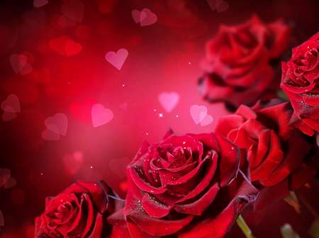 Roses and Hearts background. Valentine or Wedding Card design. Beautiful red roses bouquet over red blurred background. Flowers 