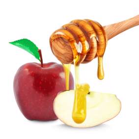 apple and honey dripping isolated on white
