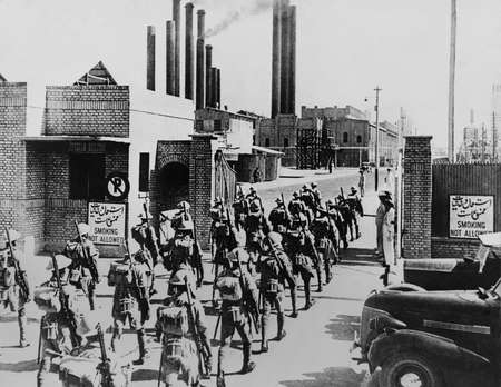 Indian soldiers enter the world&#39;s largest oil refinery on Abadan Island, Iran. They overcame defending Iranian forces during
