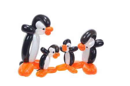 Twisted balloon Penguin family isolated on white