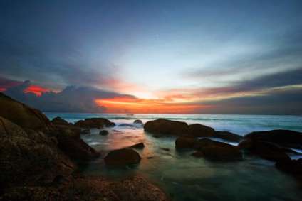 Tropical sunset. Karon beach. Phuket island. Kingdom Thailand